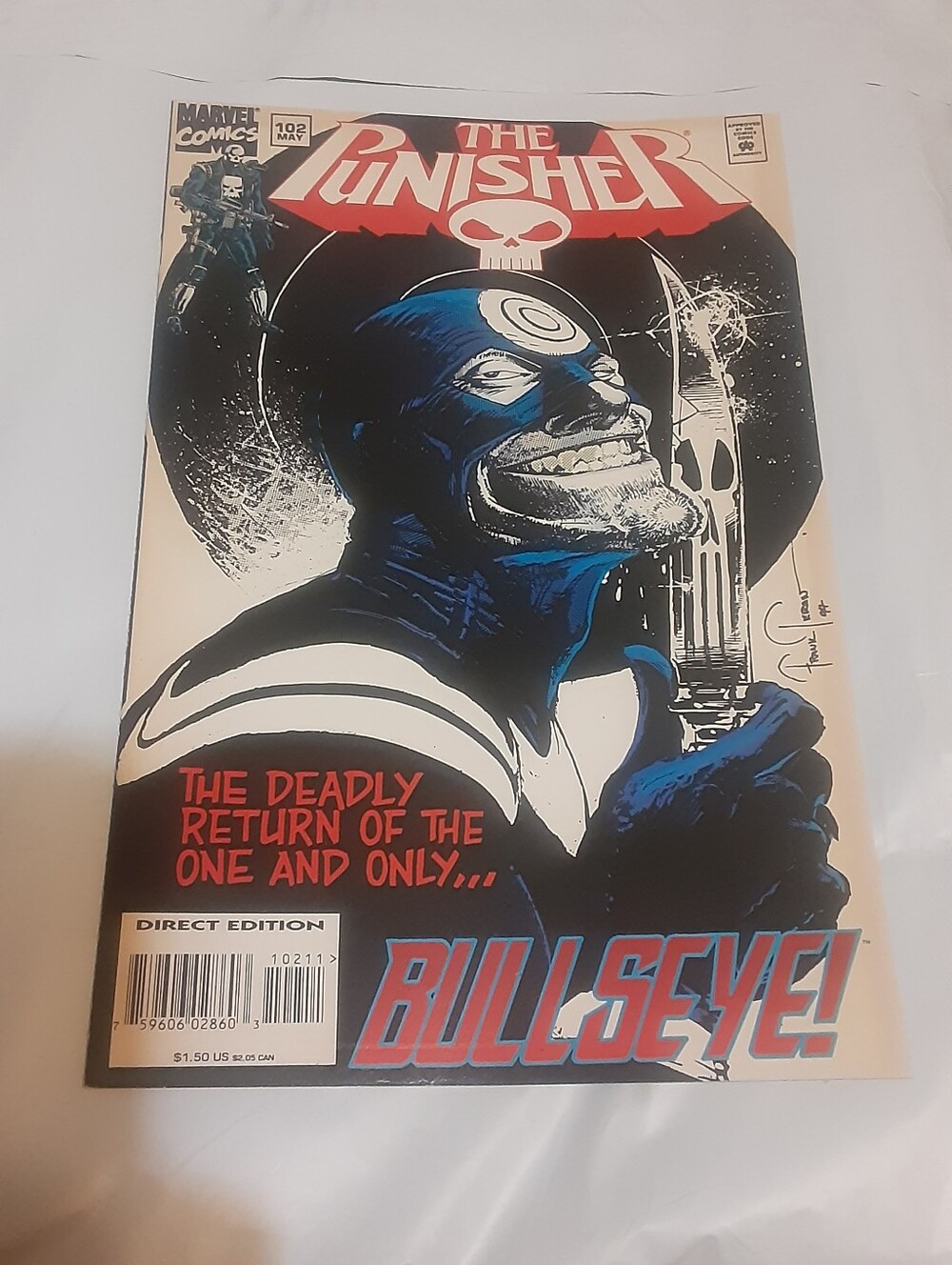 Punisher 102 single issue by Chuck Dixon. Has age discoloration on the cover